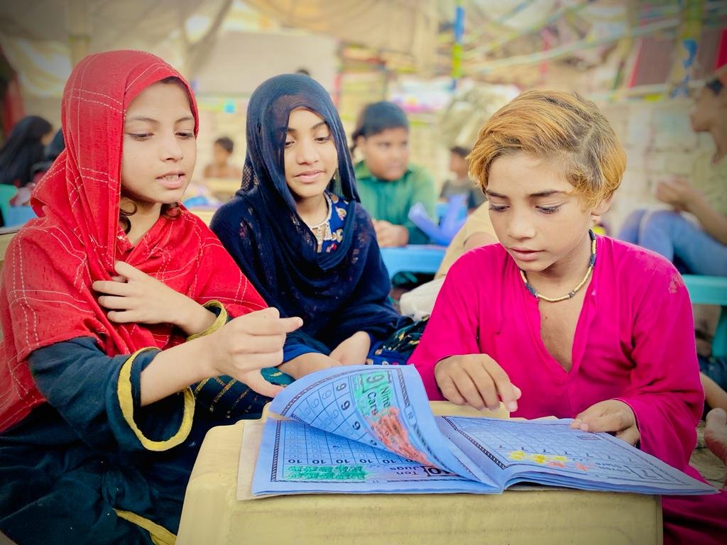GJTF Educator teaching nomadic children in a classroom